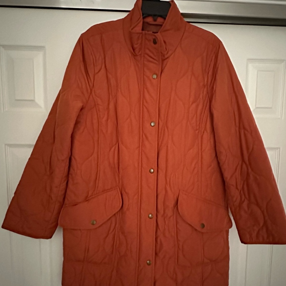 Women’s orange barn coat with snaps and zipper